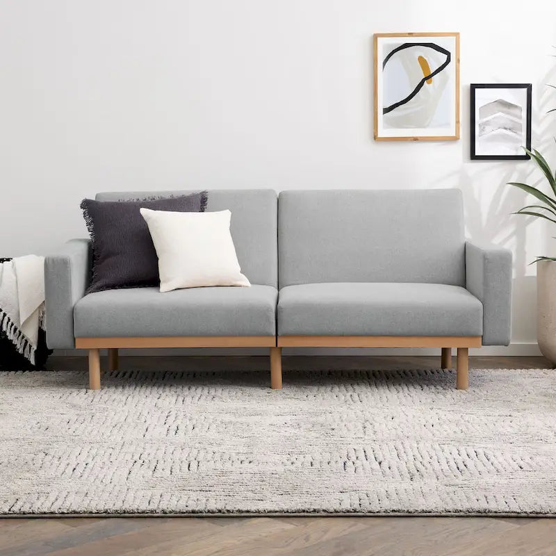 Divano letto futon convertibile con base in legno massello e cuscini in morbida schiuma memory
