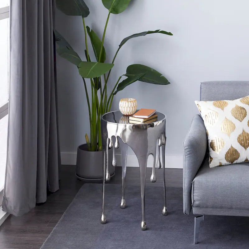 Akzent-Couchtisch oder Konsolentisch aus Aluminium mit tropfenförmigen Beinen im Schmelzdesign und getönter Glasplatte - Roche River Decor