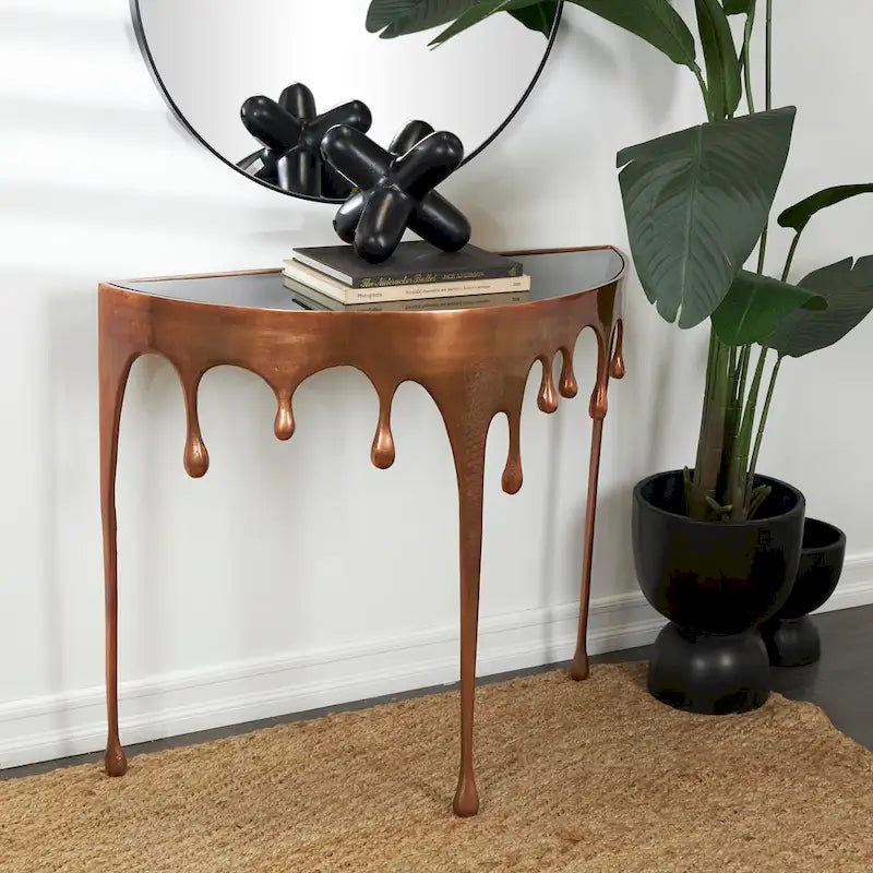 Akzent-Couchtisch oder Konsolentisch aus Aluminium mit tropfenförmigen Beinen im Schmelzdesign und getönter Glasplatte - Roche River Decor
